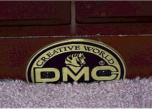DMC logo plate